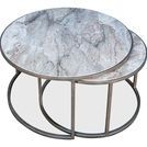 Overhead view showing the marble pattern and nesting arrangement of the round tables