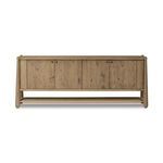 Smoked oak Salvador Sideboard with tapered legs, four doors, and paper cord shelf at the base