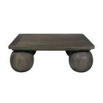 Front view showing the symmetrical round legs and thick wooden tabletop of the coffee table