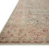Close-up angled view showing detailed border and low pile texture of Adrian Ocean / Clay Rug