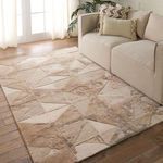 Agate rug laid out in a living room with beige sofa and natural light highlighting its neutral tones