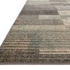 Side angle close-up showing low pile and edge binding of Bowery Storm Taupe rug