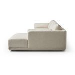 Side view showing sectional's boxed armrest and low profile base