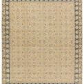 Hand-knotted traditional rug with tan background, blue floral trellis border, 8 by 10 feet size