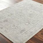 Close-up angled view revealing woven texture and subtle color variations of grey and beige