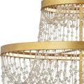 Close-up showing the bottom bell-shaped swag of glass bead strands hanging from the lowest ring