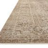 Low angle view showing the thin pile and bound edge of the Heritage Ivory / Natural rug
