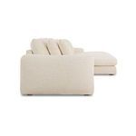 Side profile of Berga Sectional showcasing thick back cushions and chaise detailing