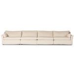 Front view showing all four seat and back cushions aligned in beige slipcover