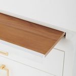 Pull-out wooden tray partially extended from the top of the Elina side table in contrasting warm wood tone
