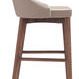 Side view highlighting chair's sleek curved backrest and wooden frame with supportive footrest bars