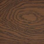 Close-up of smoked oak wood grain texture on bed frame
