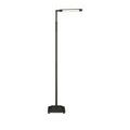 Lamp viewed from a slight angle showing vertical pole and arm extended