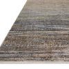 Close-up angled edge view highlighting the rug’s thin profile and color gradient