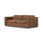 Three-quarter angle featuring sofa arm curvature and soft seat cushion detail
