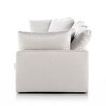 Opposite side profile highlighting boxy armrest and cushion thickness