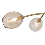 Detailed view of two glass globes from angled side emphasizing curvature of glass and brass arm connections