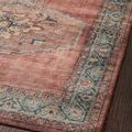 Close angled view showing corner and edge detailing with soft faded aqua floral border