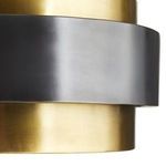 Close-up of pendant’s dark bronze floating band contrasting vintage brass cylindrical body