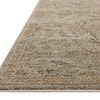 Close-up side angle showing rug’s low pile texture and intricate yarn tone variations