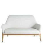 Front view highlighting tuft-free white vinyl cushions and slim natural wood legs