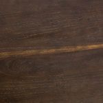 Close-up of oak tabletop wood grain and rich brown finish with visible texture details