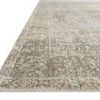 Low angle side view highlighting rug’s thin profile and flat weave texture