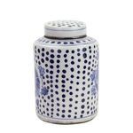 Back side view of tea jar showing dot pattern continuity and partial floral design