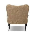 View from behind showing chair's shaped backrest and clean fabric finish