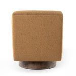 Detailed back view showing smooth amber upholstery on Bronwyn chair's backrest and base