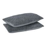 Two stacked shams angled to show both textured front and smooth back side