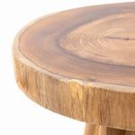 Detail of stool top edge with visible teak wood natural imperfections and clean finish