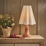 Segal Marble Mini Lamp styled on wooden surface with flowers and fabric accessory in warm room setting