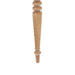 Detailed close-up of hand-carved turned front chair leg in almond cerused oak finish