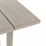 Close-up detail of tabletop plank edge with natural grey wood grain pattern