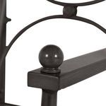 Close-up of black armrest with rounded wood-like end cap detail on Roma chair