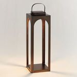 Tall rectangular outdoor lantern with bronze finish, arched openings, solar panel top, and handle