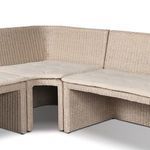 Close-up on section corner with cushion seams and rattan weaving detail