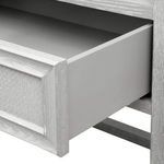 Open upper drawer showing smooth interior and consistent gray finish inside.
