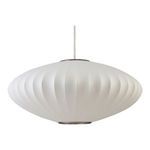 Close-up of Lys Pendant showing detailed ribbed texture on white shade