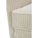 Close-up showing edge of seat cushion and adjacent barrel-back upholstery ribs