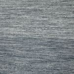 Detailed view of navy rug weave and subtle color variation in recycled fibers