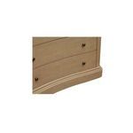 Close-up of bottom drawers and curved trim with brass knob details on Clarence dresser