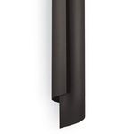 Bottom close-up emphasizing the seamless curved edges and layered steel look of the sconce
