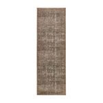 Long narrow natural jute area rug in neutral brown tones with distressed vintage floral pattern