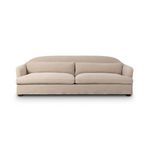 Karissa Sofa in beige slipcover with soft curves, slightly flared arms, and feather blend cushions