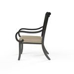 Side view of Monterey Dining Chair showing curved armrests and frame shape