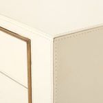 Close-up of top corner seam with visible stitching and smooth ivory leather