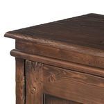 Detailed view of top corner and door hinge with dark aged pine texture