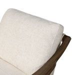 Close-up showing boxing detail on back cushion and wood frame connection
